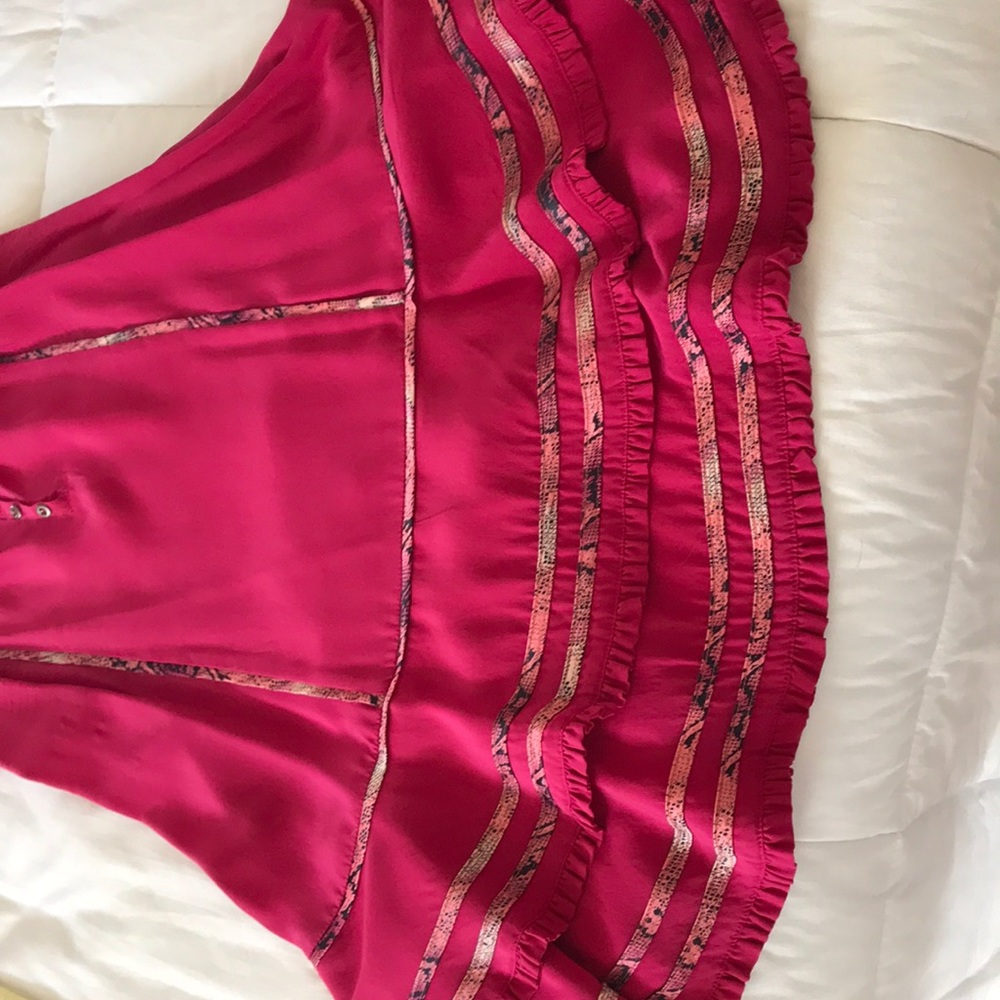Beautiful silk top. To small for me now. Love it